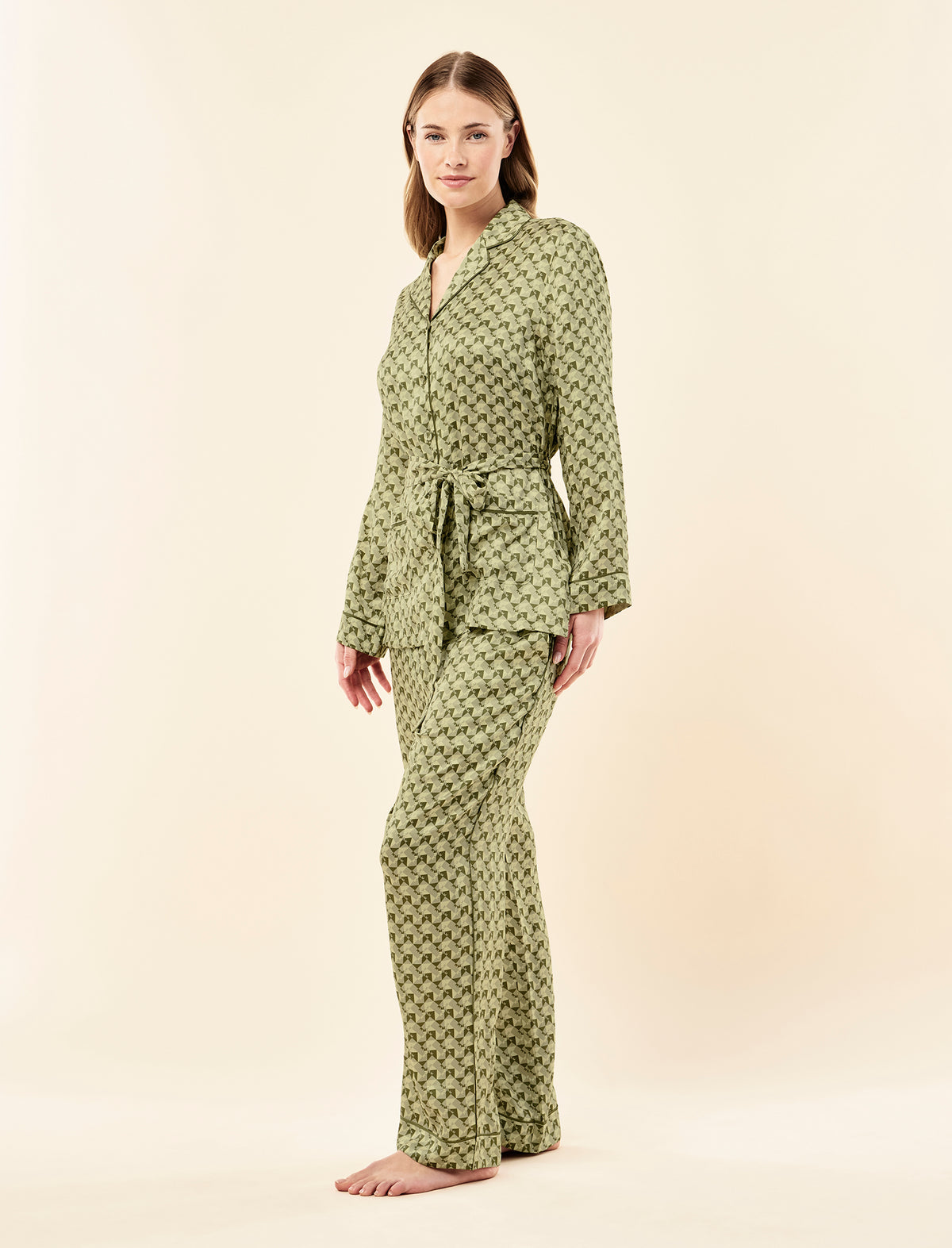 Sianie wearing the Karen Walker Monogram Tiles Silk Wrap PJ Set