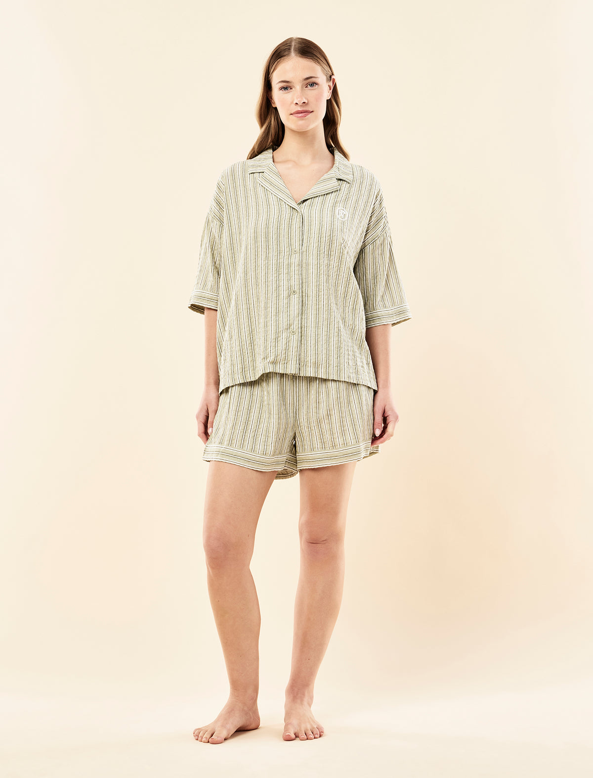 Sianie wearing the Karen Walker Seersucker Stripe Boxer PJ Set